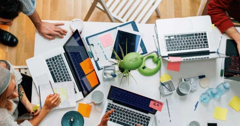 people-sitting-at-table-all-working