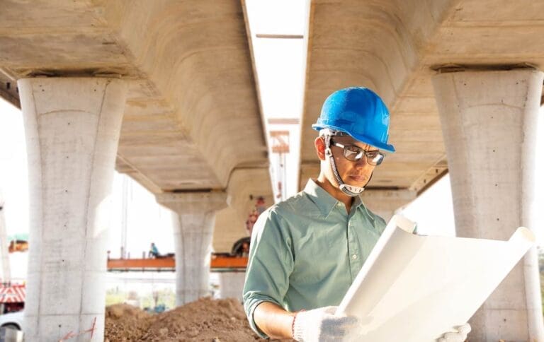 Civil engineers are checking the construction of the expressway.